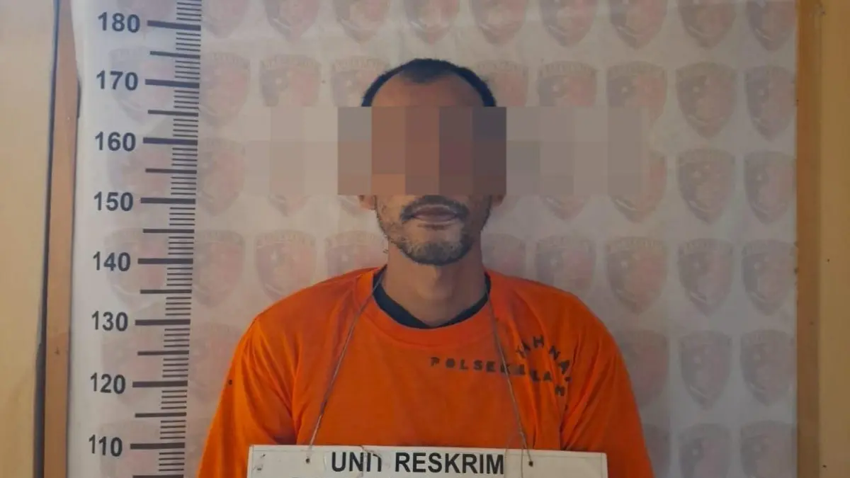 Tersangka HS saat diamankan Polisi.(Foto:Dok.Polres)