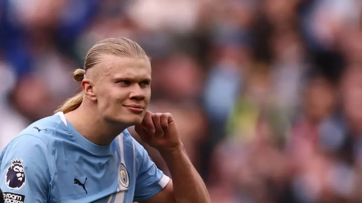 Erling Haaland merayakan gol kemenangan untuk Manchester City saat menaklukkan Arsenal di Etihad Stadium.