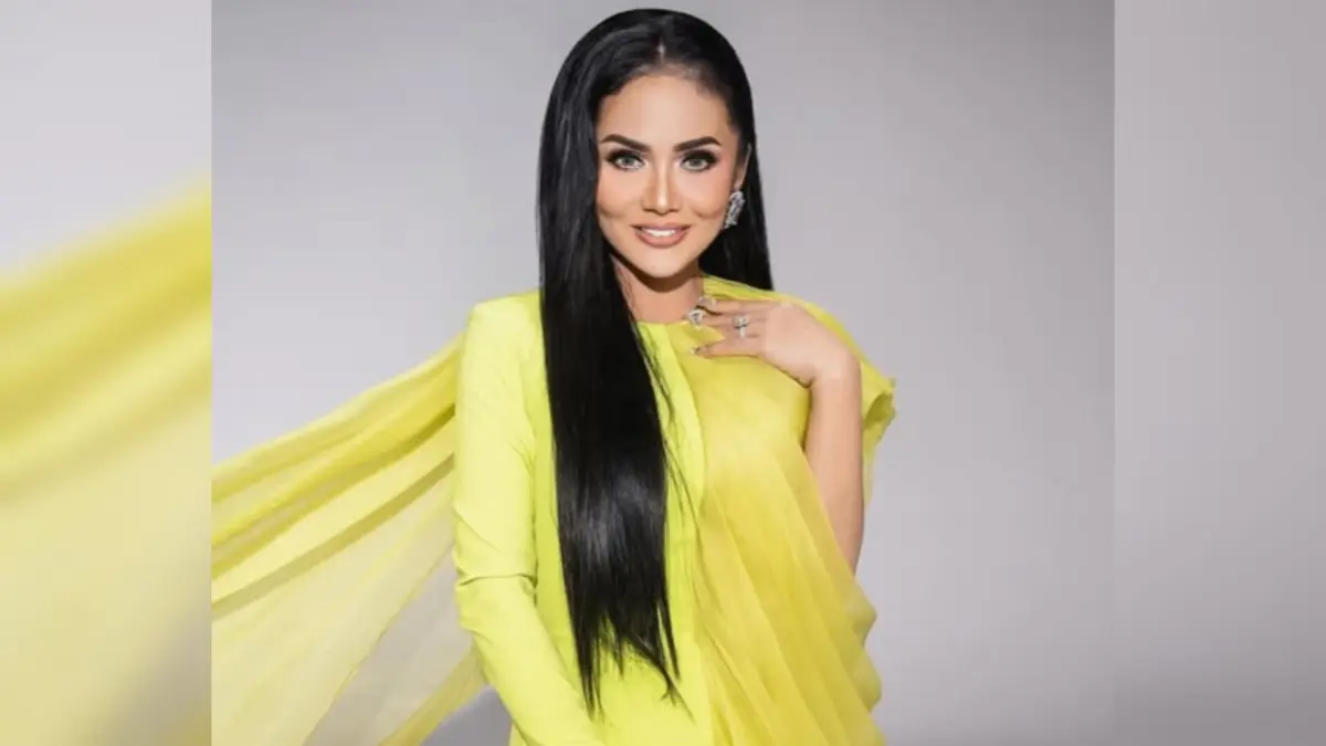 Kris Dayanti menerima penghargaan Women’s Inspiration Awards 2026 usai tampil memukau dan mengajak para pejabat bernyanyi bersama di panggung.