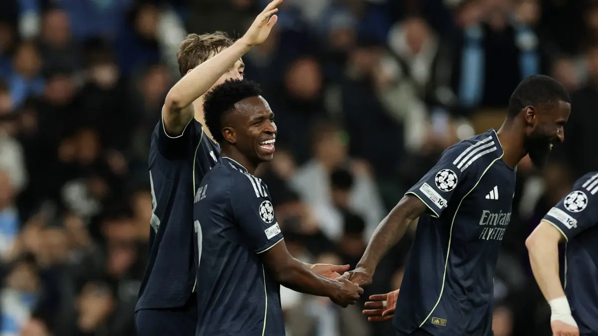 Pemain Real Madrid Vinicius Jr merayakan gol ke gawang Espanyol pada laga LaLiga di RCDE Stadium, Madrid menang 2-0.