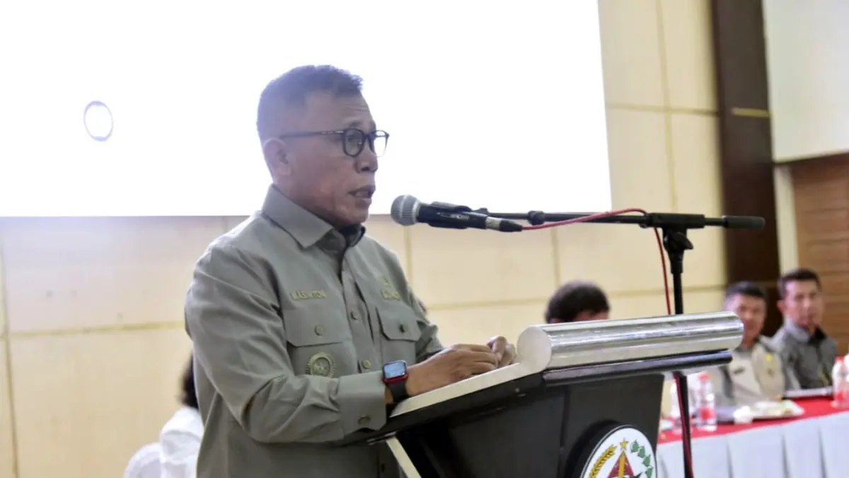  Bupati Tapanuli Tengah Masinton Pasaribu menyampaikan sambutan saat Workshop Menata Ulang Kabupaten Tapteng dan Ekosistem Batang Toru di GOR Pandan, Selasa (12/5/2026). 