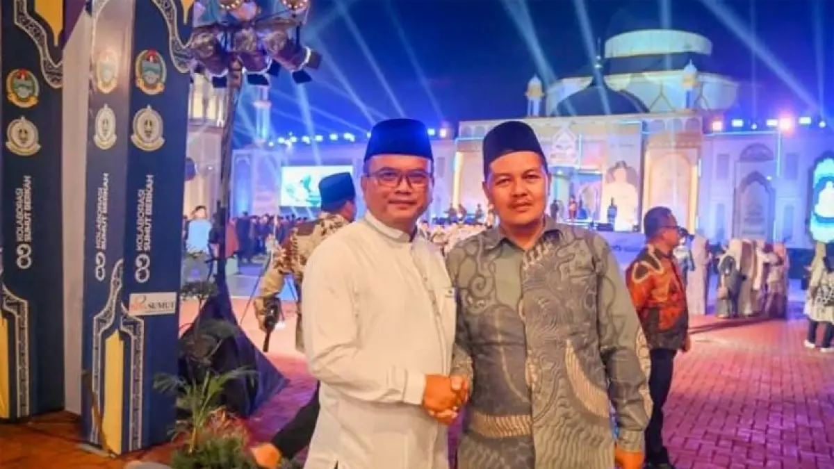 Kakan Kemenag Kota Padangsidimpuan, Dr. H. Erwin Kelana bersama Wali Kota Padangsidimpuan Dr. H.Letnan Dalimunthe.