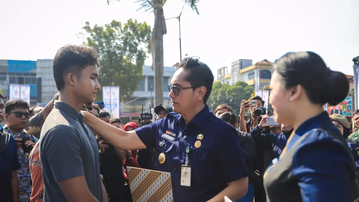 Kepala Bidang SMP Dinas Pendidikan dan Kebudayaan Kota Medan Prayogi menjelaskan perluasan Program Tebus Ijazah Tahun 2026. Program tersebut kini menjangkau madrasah swasta dan meningkatkan kuota penerima manfaat menjadi 500 siswa.