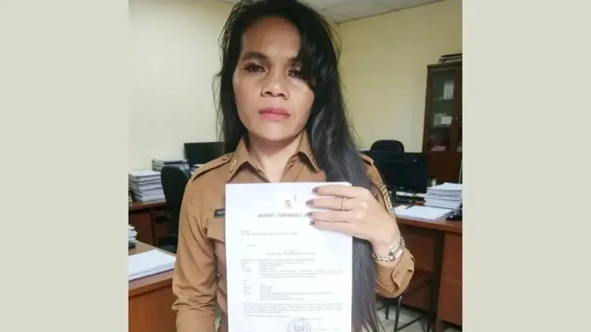 Ida Rohani Sinaga yang dipecat sepihak sebagai ASN di UPT Pasar Siborong-borong, Dinas Koperindag Taput.