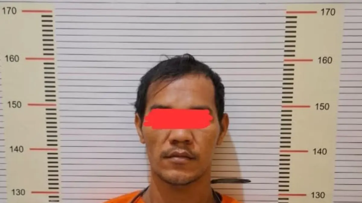 HMP (32) saat menjalani pemeriksaan di Polres Tapteng.
