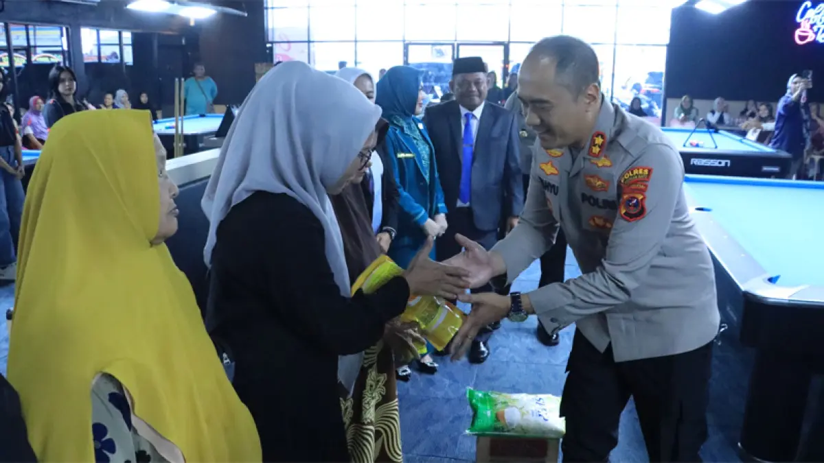 Kapolres Labuhanbatu AKBP Wahyu Endrajaya SIK MSi saat menghadiri acara Grand Opening Capital Pool & Cafe.