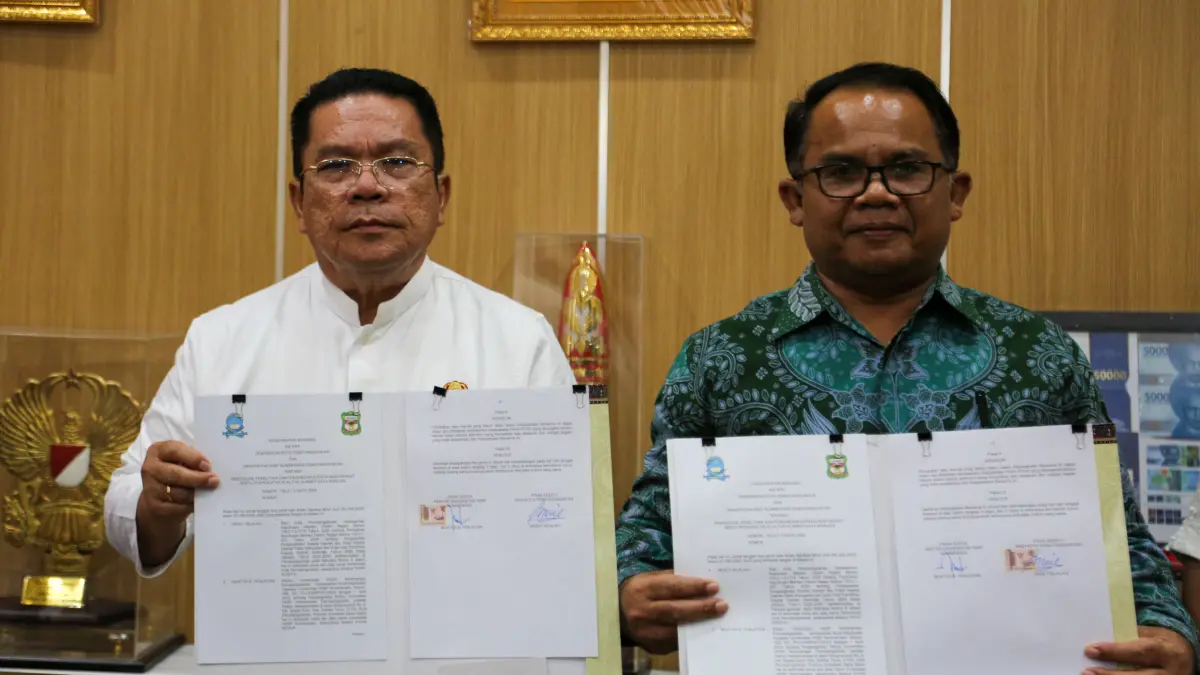 Wali Kota Pematangsiantar Wesly Silalahi SH MKn dan Rektor UHKBPN Pematangsiantar Dr Muktar B Panjaitan. 
