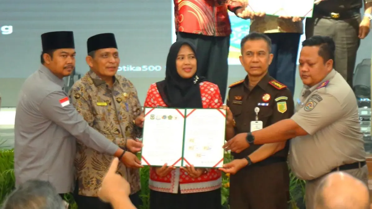 Wakil Wali Kota Herlina menghadiri penandatanganan Nota Kesepahaman (MoU) dan Perjanjian Kerja Sama tentang Percepatan Pendaftaran Tanah Wakaf.