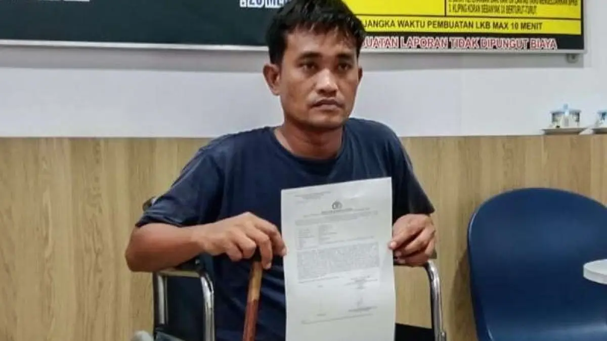 Korban saat membuat laporan ke Polres Batu Bara.