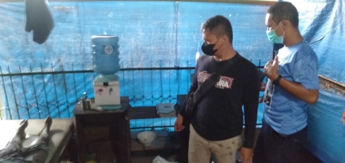 Kanit Reskrim Polres Pematangsiantar Ipda Moses Butarbutar saat di lokasi. (f: metro/matius gea)