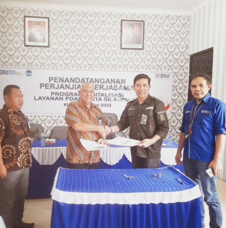  Penandatanganan kerjasama antara PDAM Tirta Silau Piasa Asahan dengan BNI. (Istimewa)