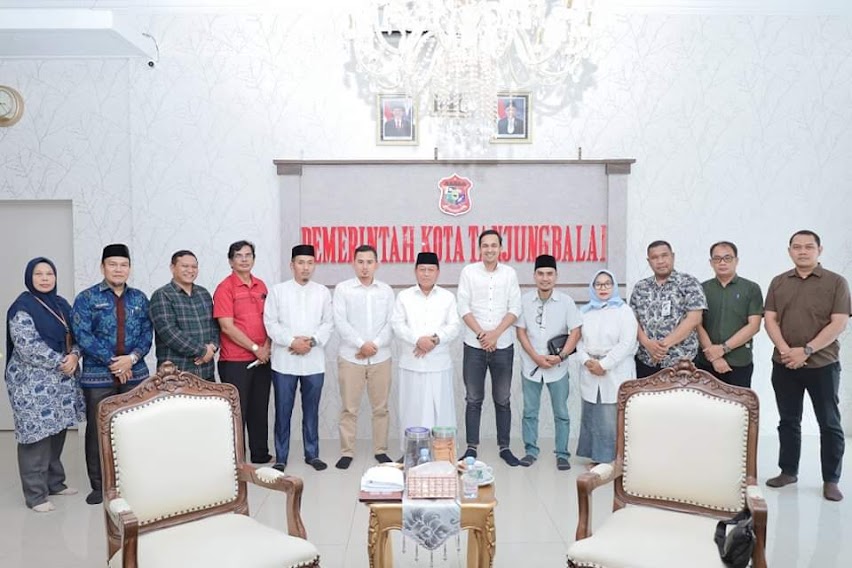 Foto: Komisioner KPU Tanjungbalai bersama Wali Kota Tanjungbalai.