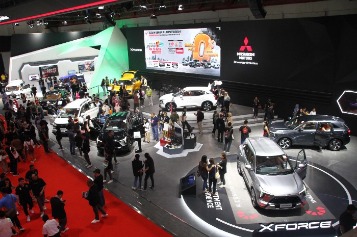 MELEBIHI TARGET : Tiga Model Mitsubishi yakni Expander, Pajero Sport  dan Xforce mendominasi penjualan Mitsubishi pada ajang IIMS 2024.