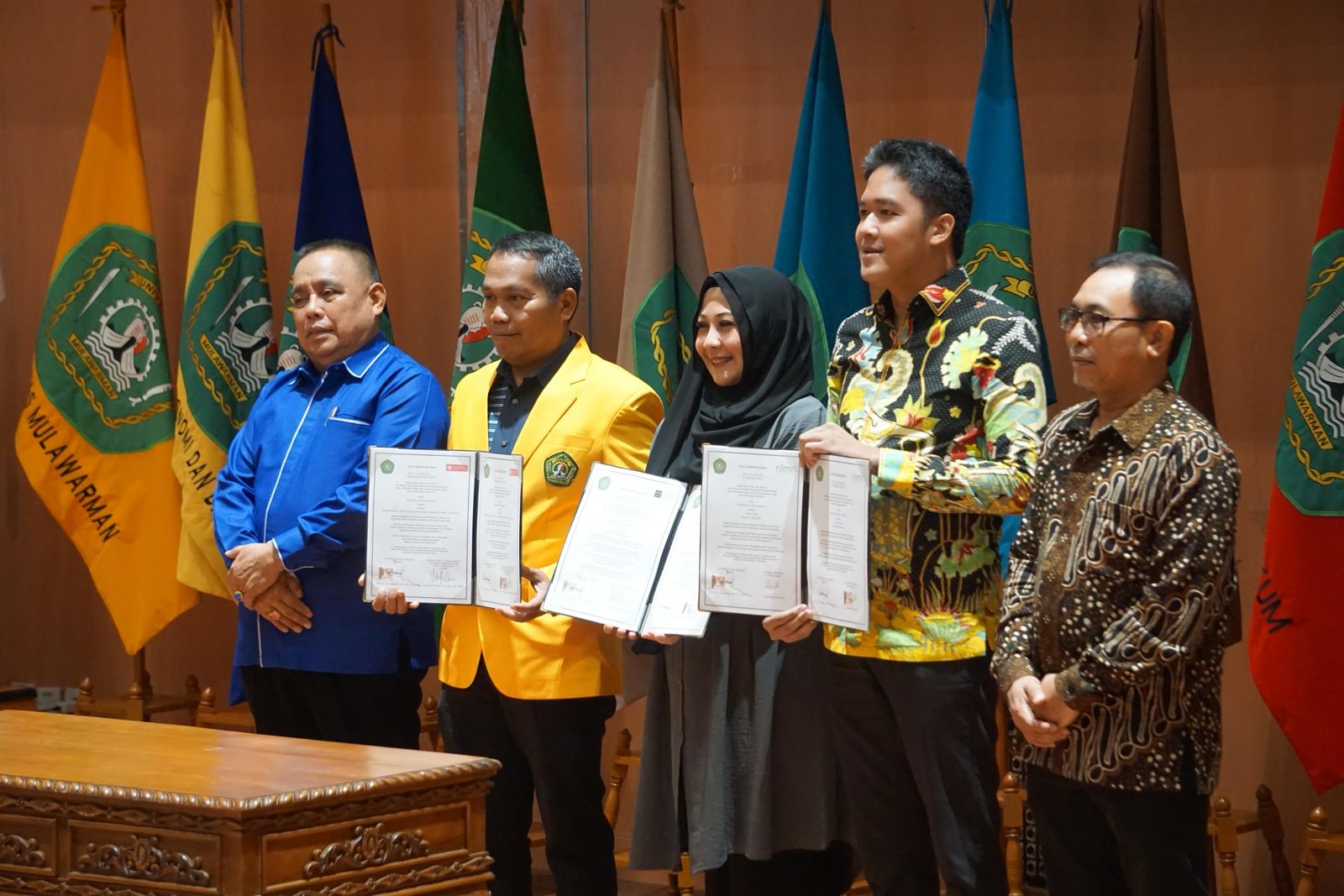 JALIN KERJA SAMA: Penandatanganan nota kesepahaman tri dharma perguruan tinggi oleh Unmu, IABC Indonesia, NoLimit, dan VMCS Advisory.