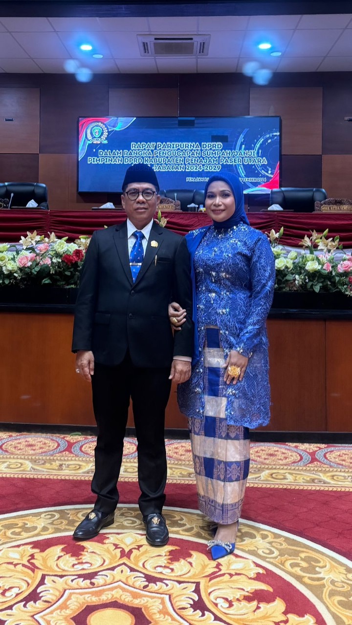 DEFINITIF: Syahrudin M Noor didampingi istri usai pengambilan sumpah pimpinan definitif DPRD PPU, kemarin.