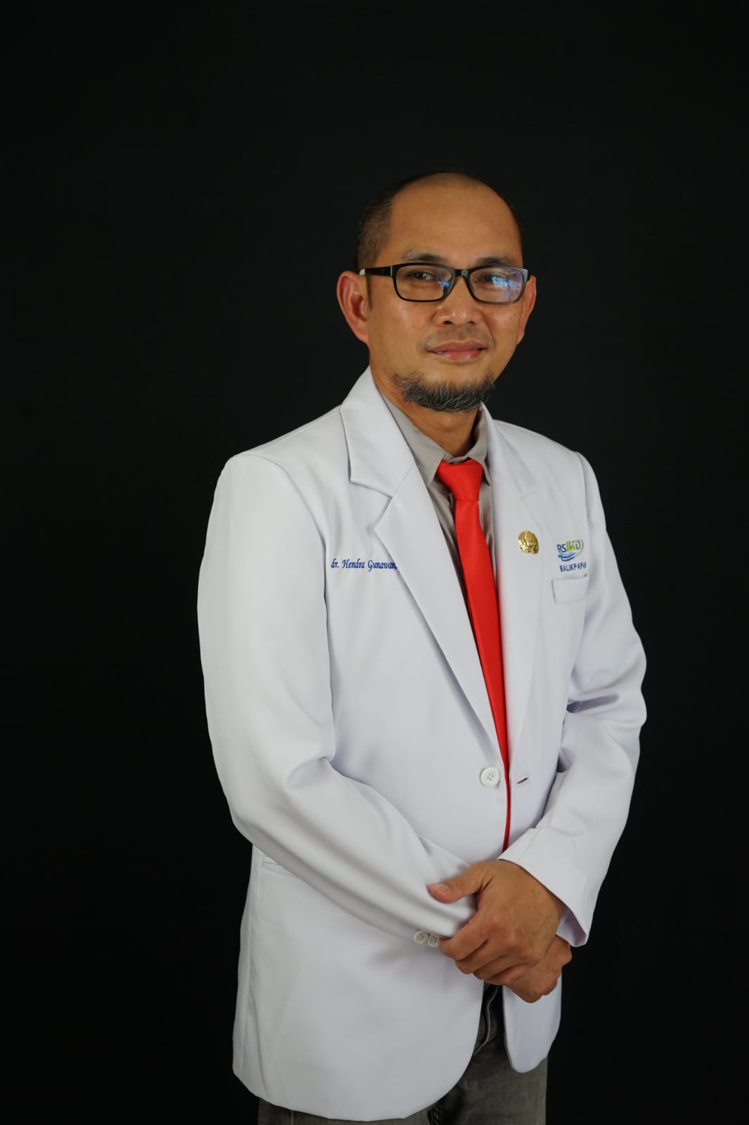 dr Hendra Gunawan SpOT