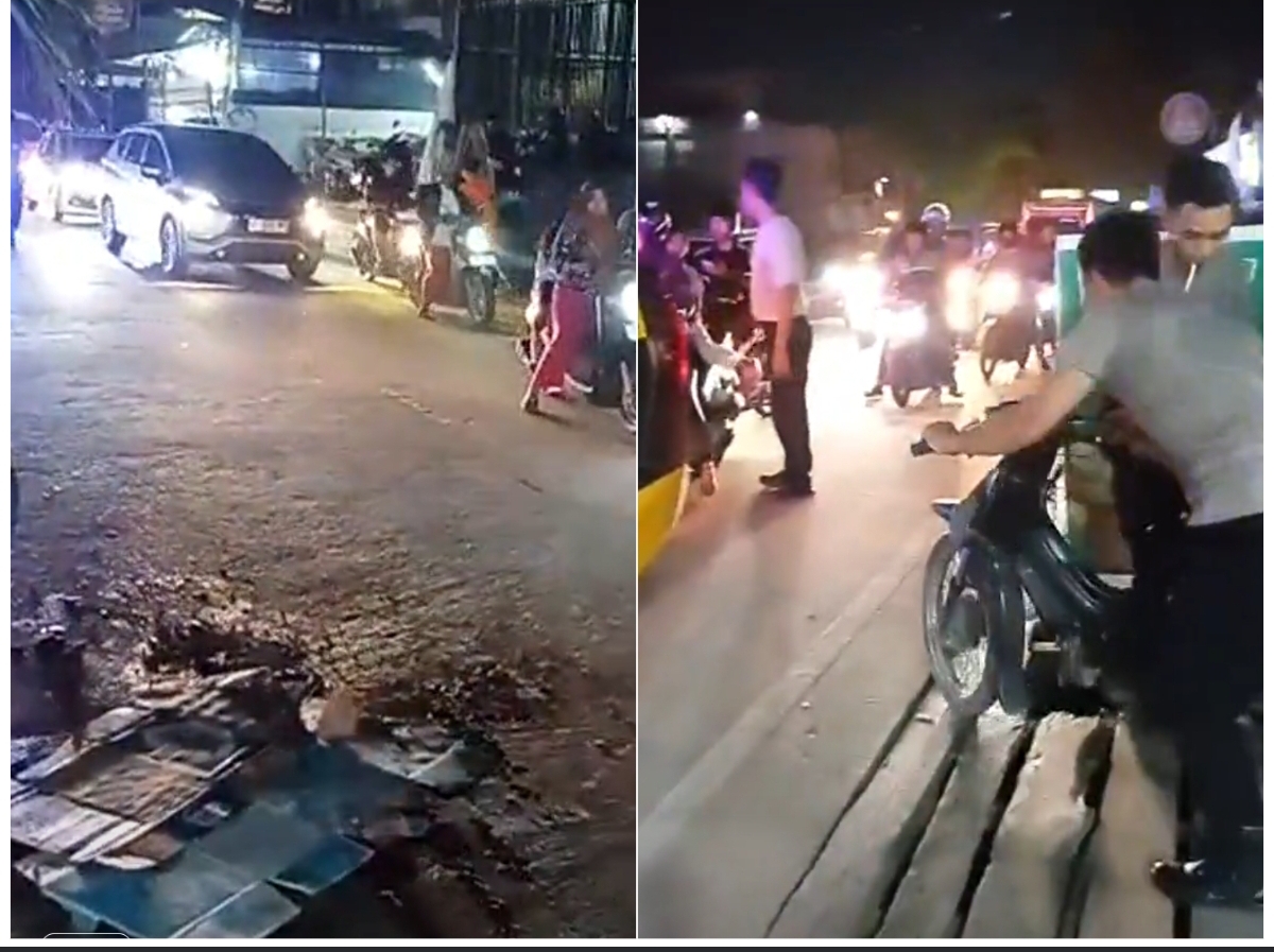 KECELAKAAN MAUT: Tempat kejadian perkara di Jalan Damanhuri,  Samarinda. Tampak petugas membawa sepeda motor pasangan suami tersebut. (FOTO: IST)