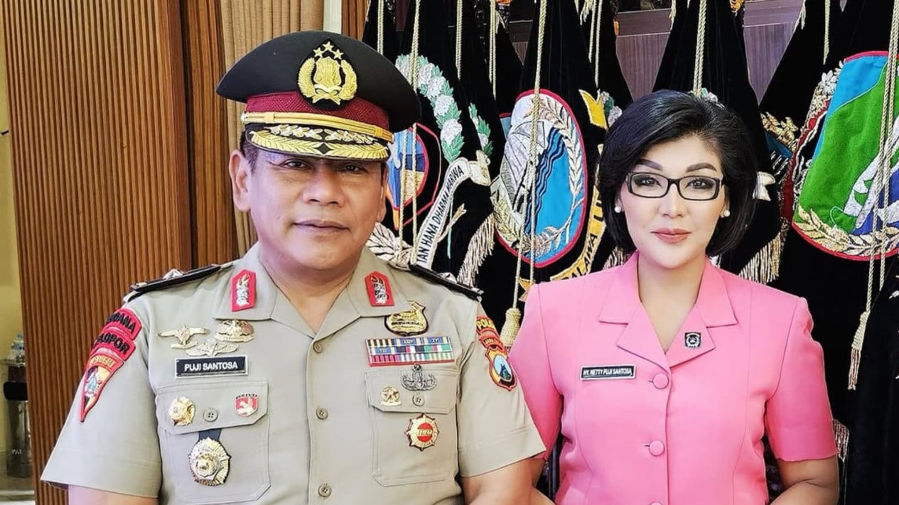 AKBP Netty Siagian (kanan) bersama suami.