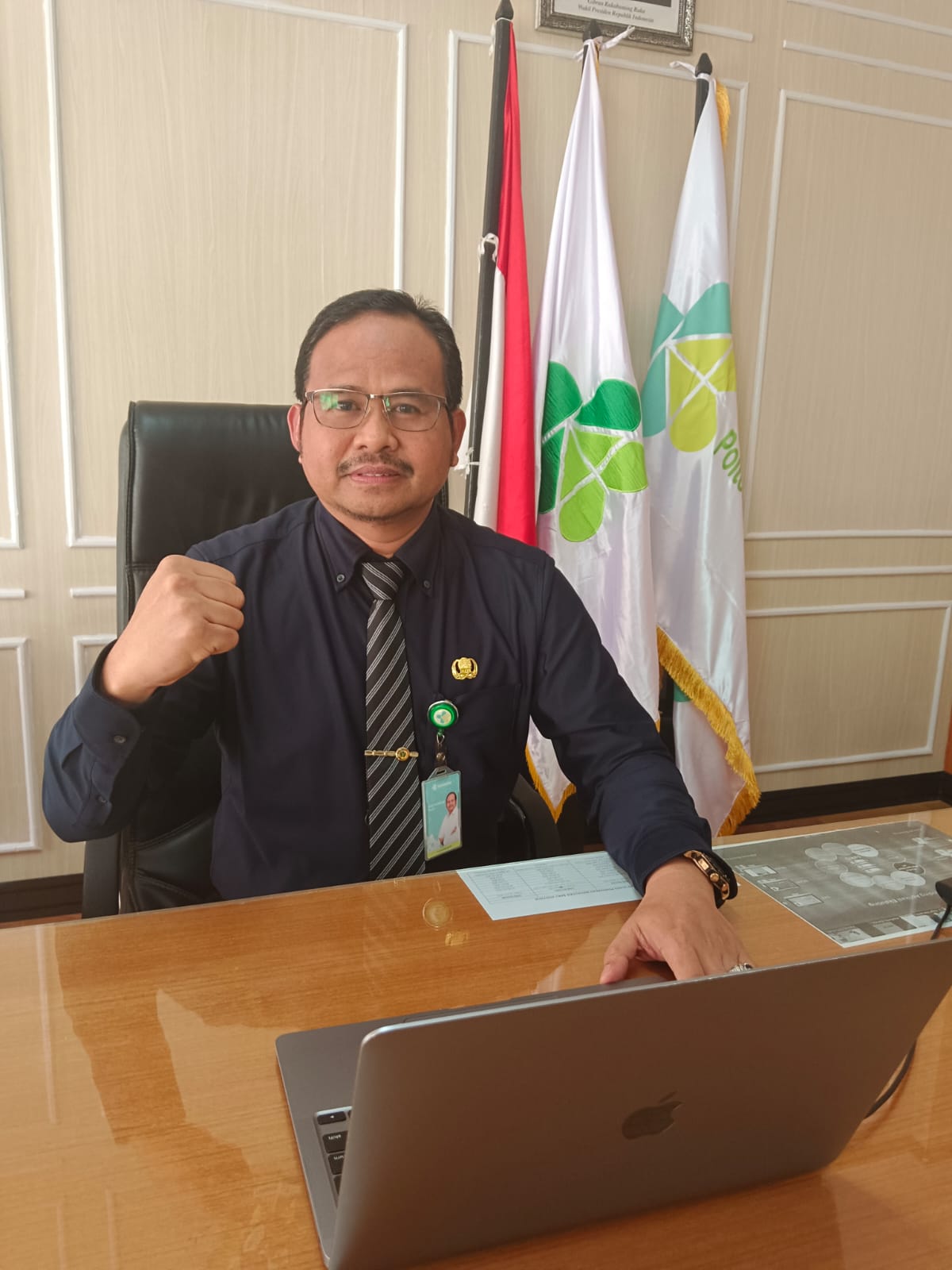 Dr Andi Parellangi