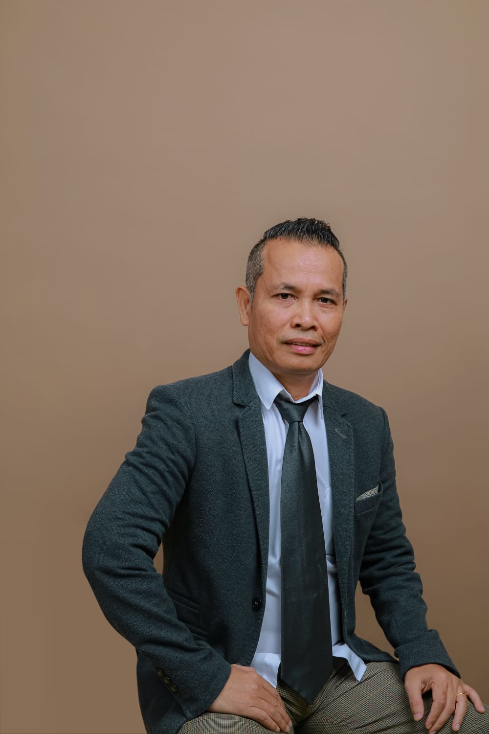 Piatur Panggaribuan.