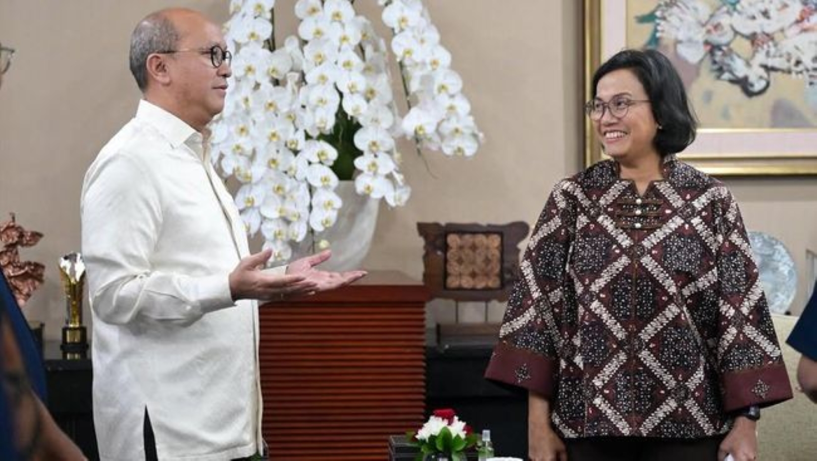 Rosan Roeslani dan Sri Mulyani.