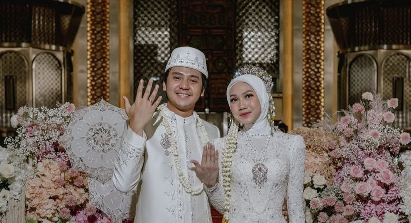Potret pernikahan Arbani Yasiz dengan Raissa Ramadhani.