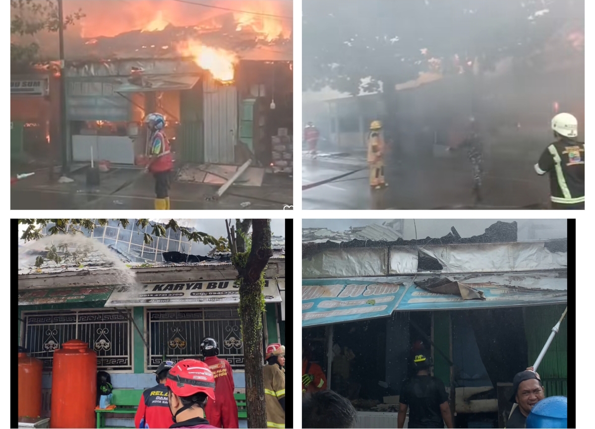 Petugas pemadam kebakaran dan relawan berusaha memadamkan api yang berkobar di RM Bu. (Foto Rama)