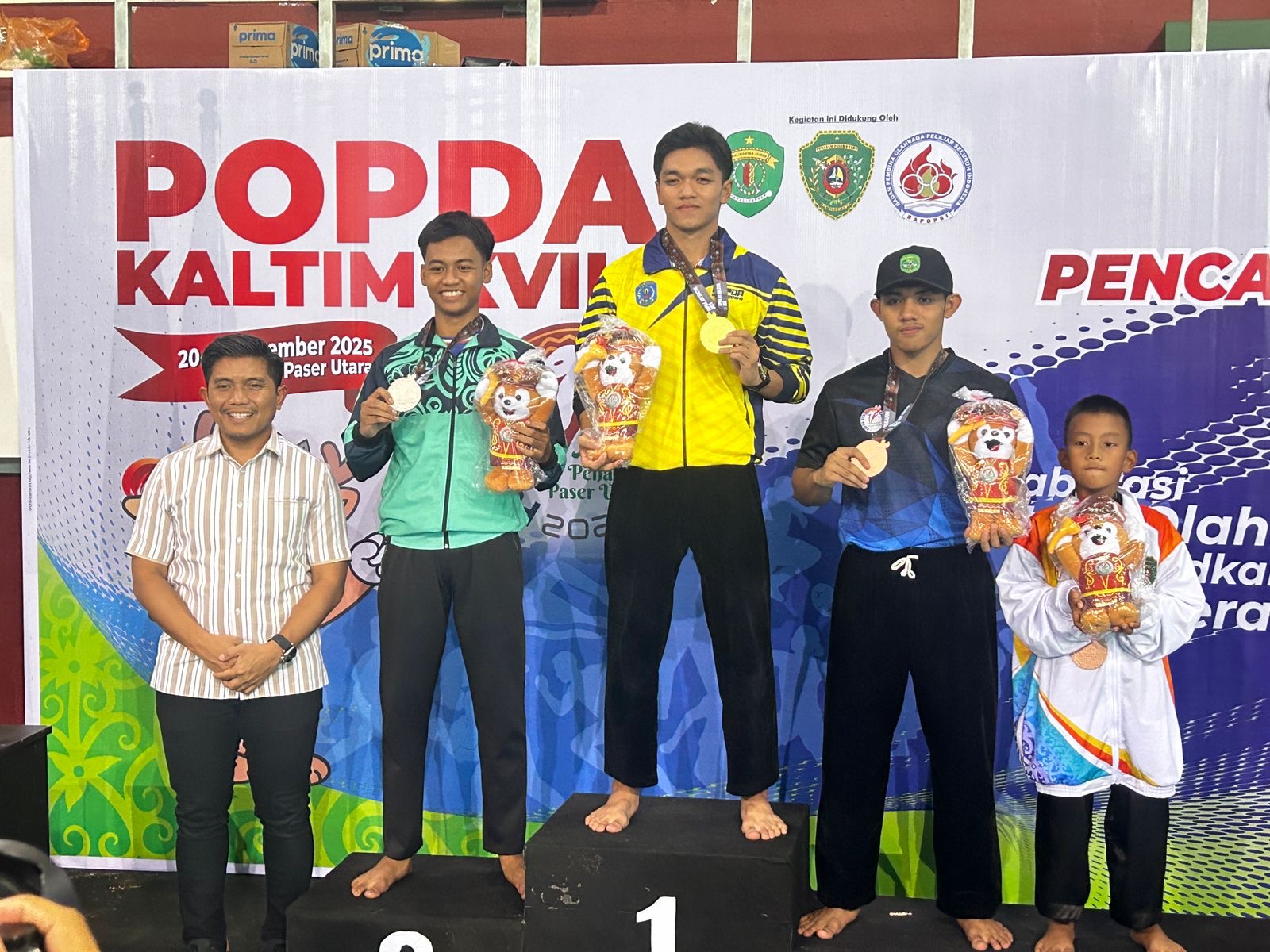 NAIK PODIUM: Atlet pencak silat Bontang berhasil meraih medali emas di Popda XVII PPU.