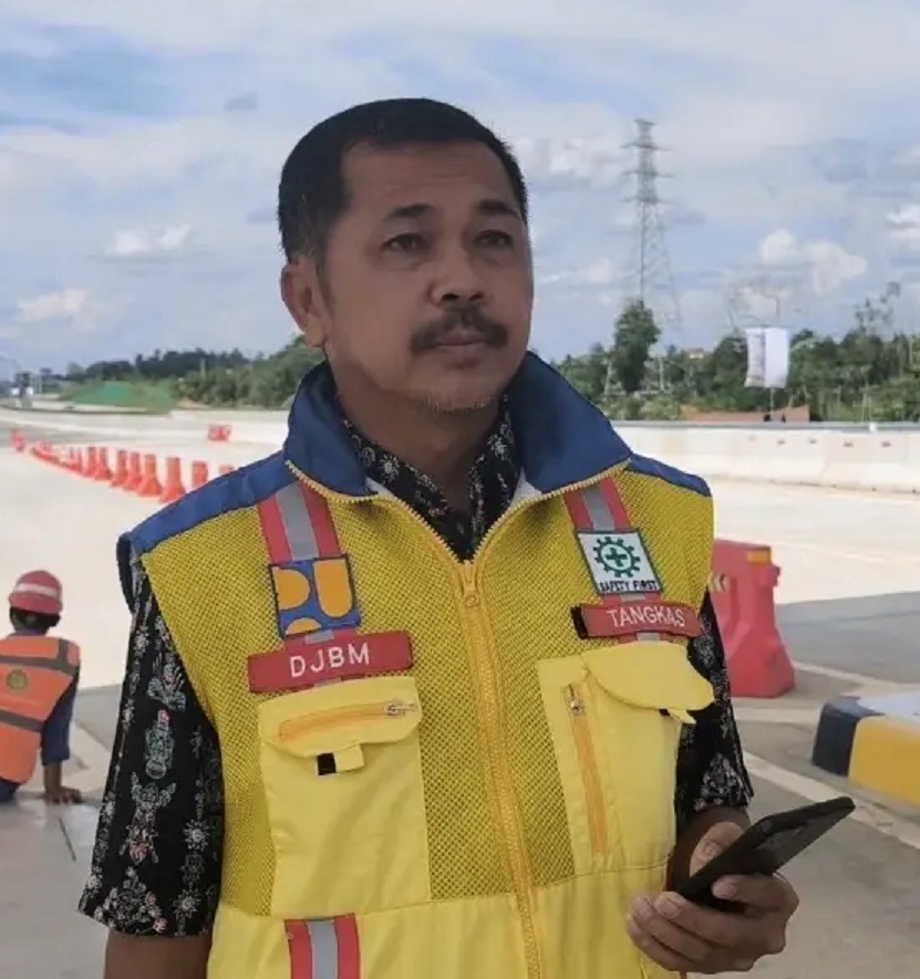 Koordinator Lapangan Pembangunan Tol IKN Segmen 5B (Jembatan Pulau Balang&ndash;Simpang Riko), Tangkas. 