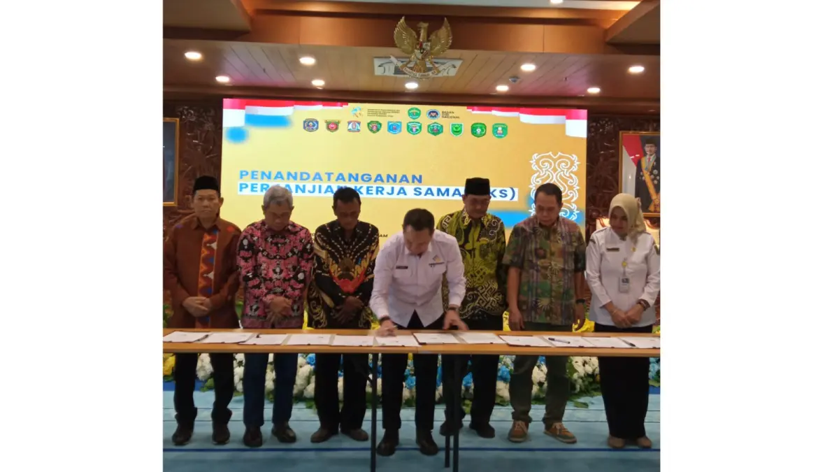 Penandatanganan PKS dalam Rakorda BKKBN Kaltim 2026 di Ruang Ruhui Rahayu.