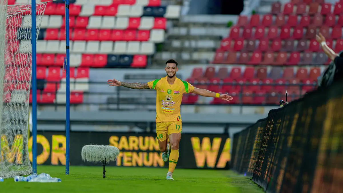 Striker Persebaya Surabaya, Jefferson Silva, saat merayakan gol krusialnya ke gawang Arema FC di laga tandang. (Dok. Persebaya)