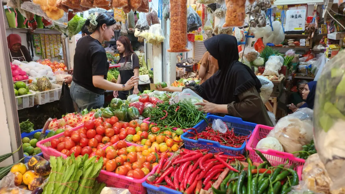 TERKENDALI: Meningkatnya hasil panen menjadi faktor utama yang menekan harga komoditas.