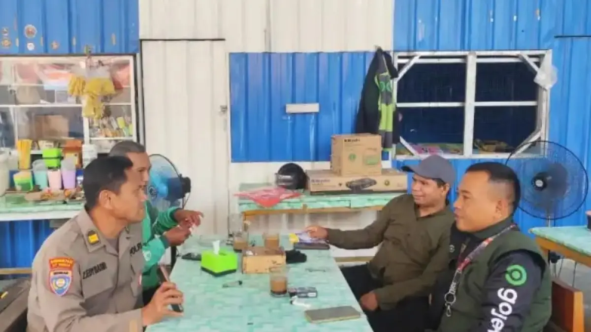 BERBAUR: Dialog terbuka antara kepolisian dan masyarakat, khususnya para pengemudi ojol.