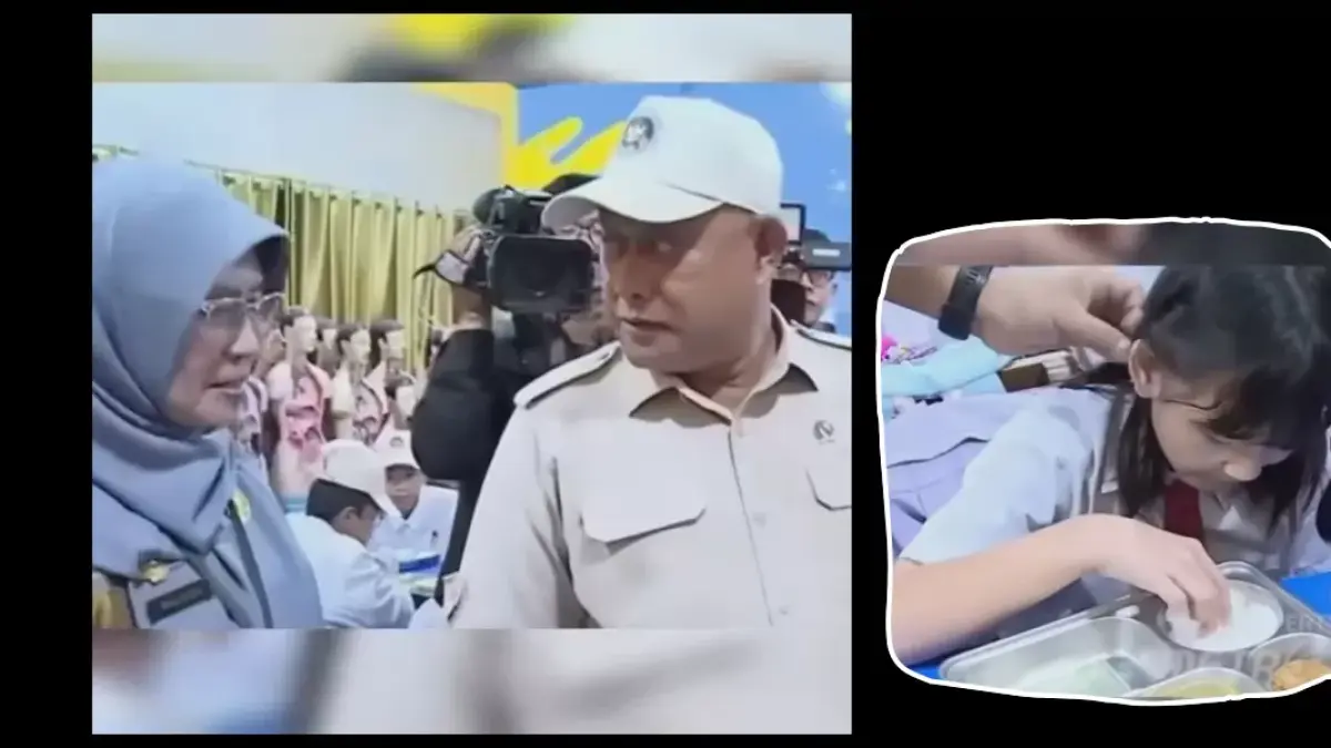 Momen Dadan Hindayana di dekat seorang siswi SD yang sedang menyantap makanannya. 