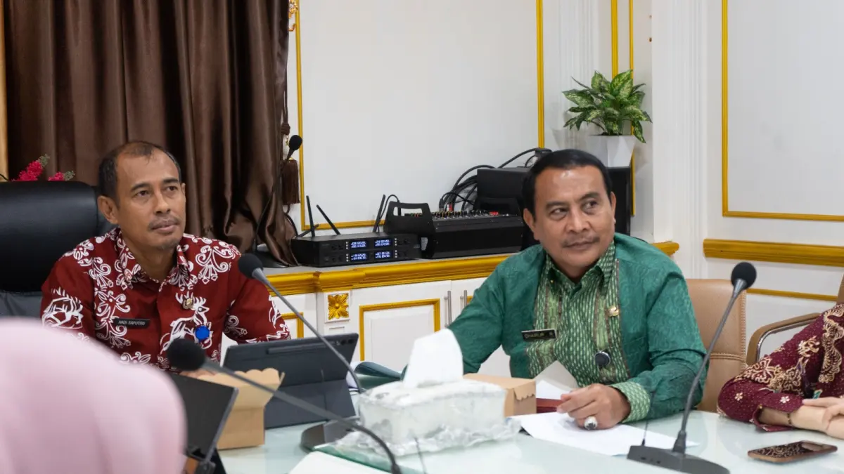 Hadi Saputro (kiri) bersama Chairul Rozikin mengikuti rapat evaluasi pengukuran IPKD Tahun Anggaran 2024 (tahun ukur 2025) secara virtual, Kamis (18/6/2026). (IST)