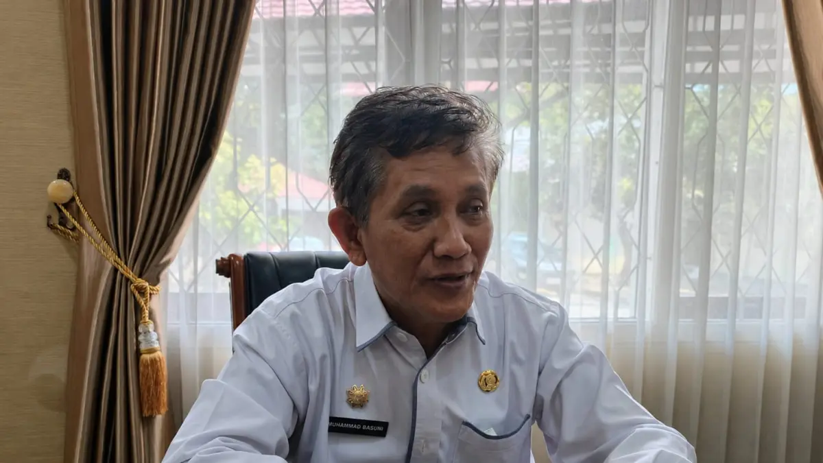 CATATAN: Kepala Dinas Pemberdayaan Masyarakat dan Desa Kutim, Muhammad Basuni. (JUFRIADI/KP)