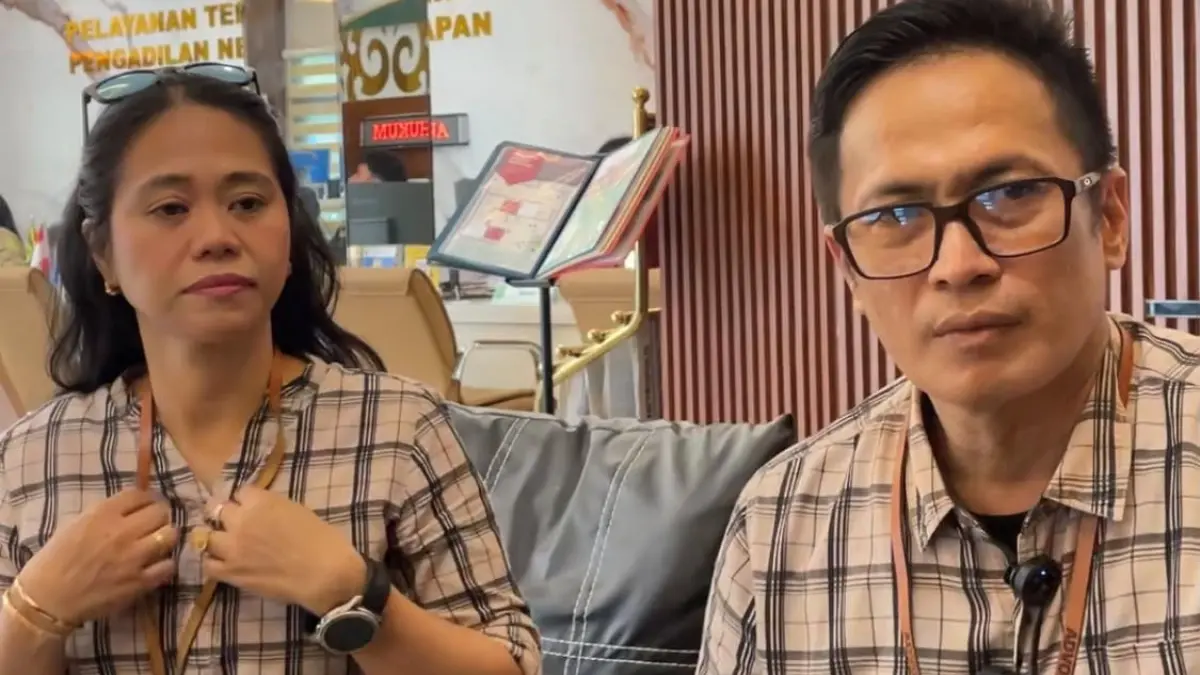Yuliana Rombe dan Indra Gunawan memberikan keterangan saat ditemui di PN Balikpapan, Kamis (10/9). (FOTO M TAUFIK/KP)