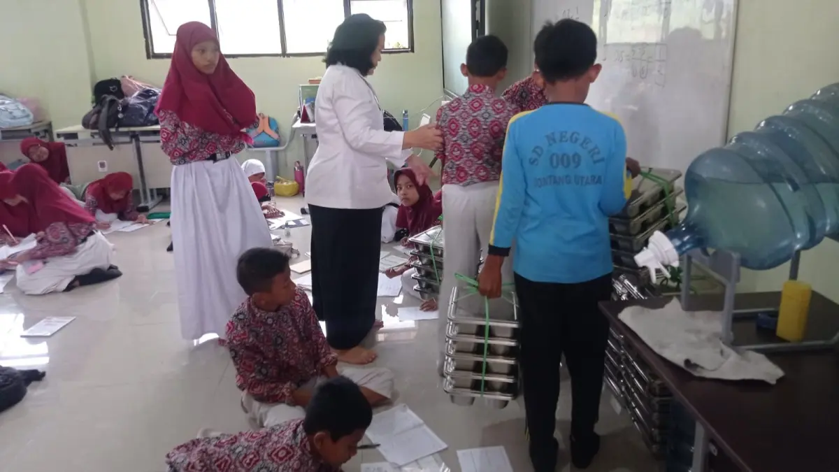 DIBAGIKAN: MBG akan disalurkan kembali pasca Pemkot Bontang mencabut skema pembelajaran jarak jauh, Senin (21/9/2026). (ADIEL KUNDHARA/KP)