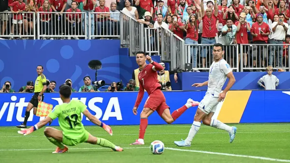 Cristiano Ronaldo mencetak gol di laga Piala Dunia 2026 Portugal vs Uzbekistan. (AFP/Ronaldo Schemidt)