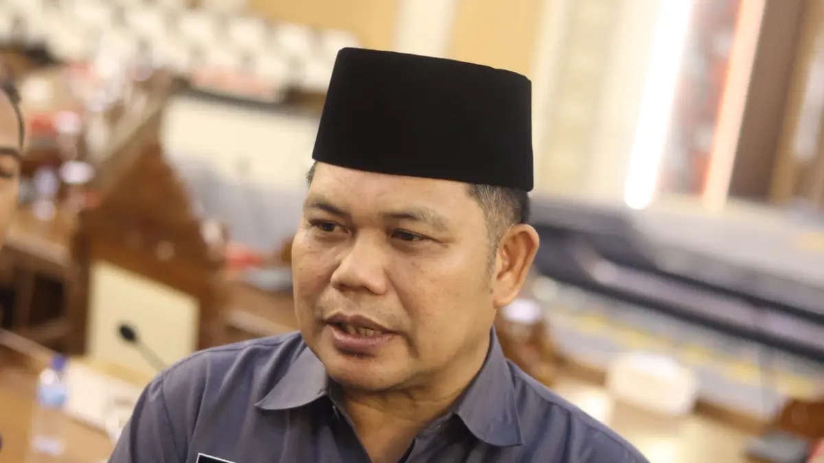 Plh Sekretaris Daerah Kota Balikpapan, Zulkifli, memaparkan strategi optimalisasi PAD melalui digitalisasi pajak dan penerapan QRIS DUO di Balikpapan. (ANGGI PRADITHA/KALTIM POST)