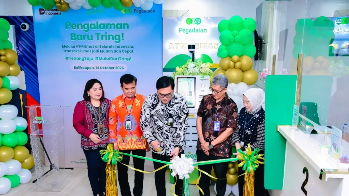 Suasana peluncuran ATM Emas Pegadaian di Kantor Cabang Damai Balikpapan, Rabu (14/10/2026). Inovasi ini memangkas waktu tunggu penarikan emas digital menjadi transaksi fisik yang cepat, aman, dan telah mengantongi sertifikasi mutu ISO 9001:2015 serta kesesuaian prinsip syariah MUI.