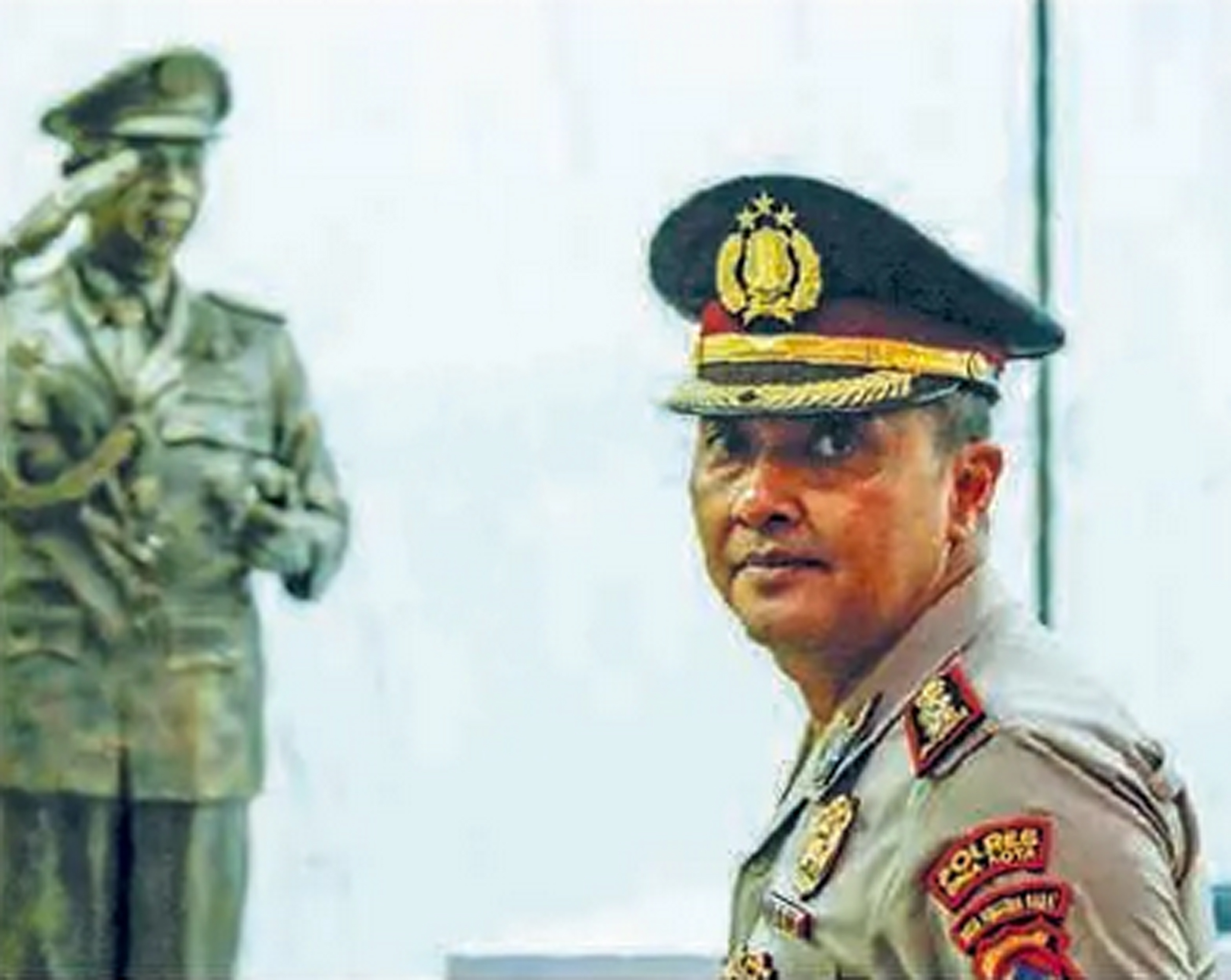 AKBP Didik Putra Kuncoro keluar dari ruang Sidang Komisi Kode Etik Polri di Gedung TNCC Mabes Polri, Jakarta, kemarin (19/2).