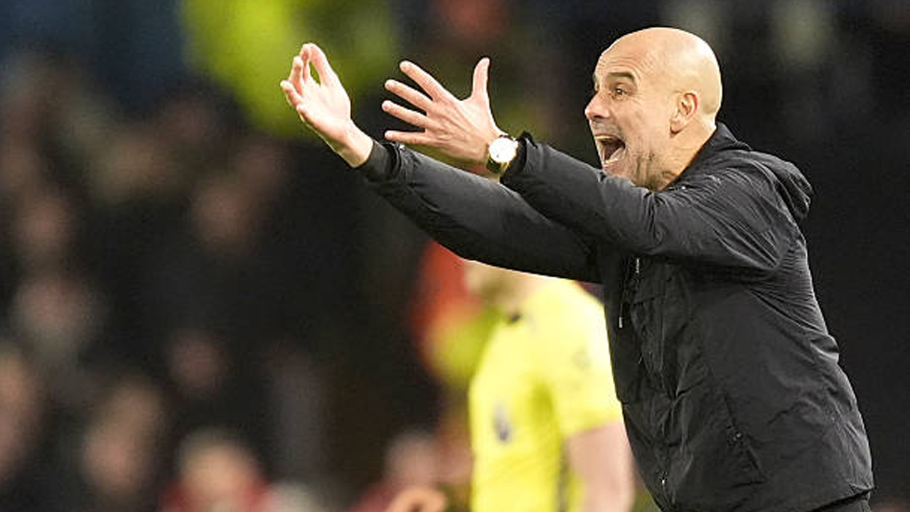 Pep Guardiola dalam laga bersama Man City