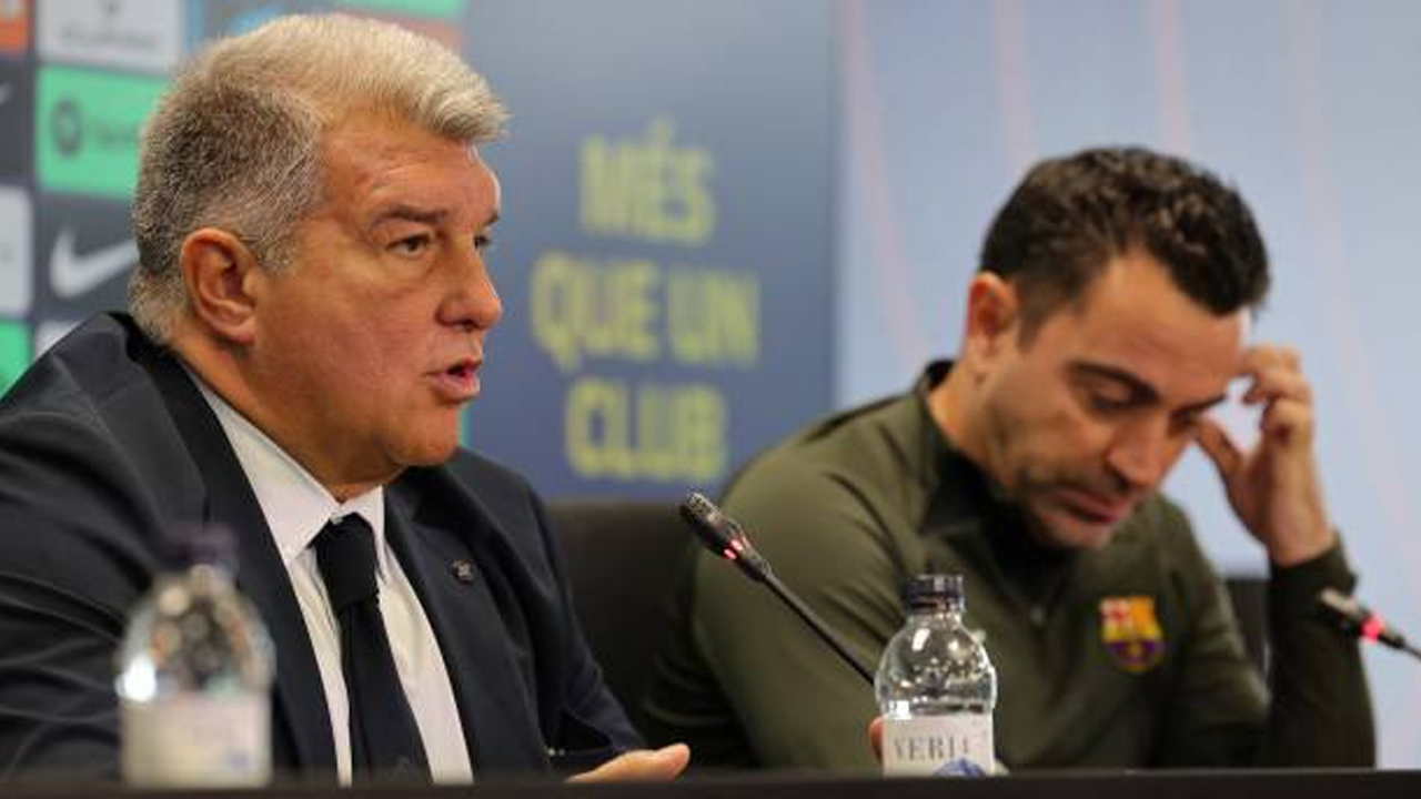 Konpers bersama dari Joan Laporta dan Xavi Hernandez