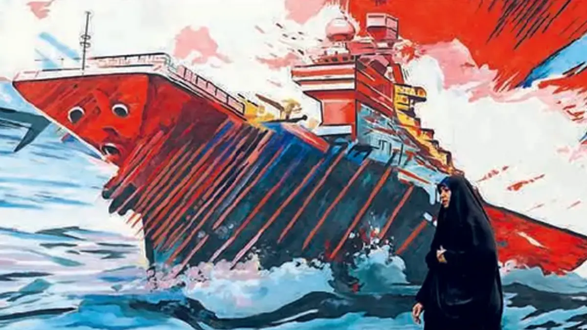 SEMANGAT PERLAWANAN: Seorang pejalan kaki melewati mural anti-AS dan Israel di Teheran (21/4).