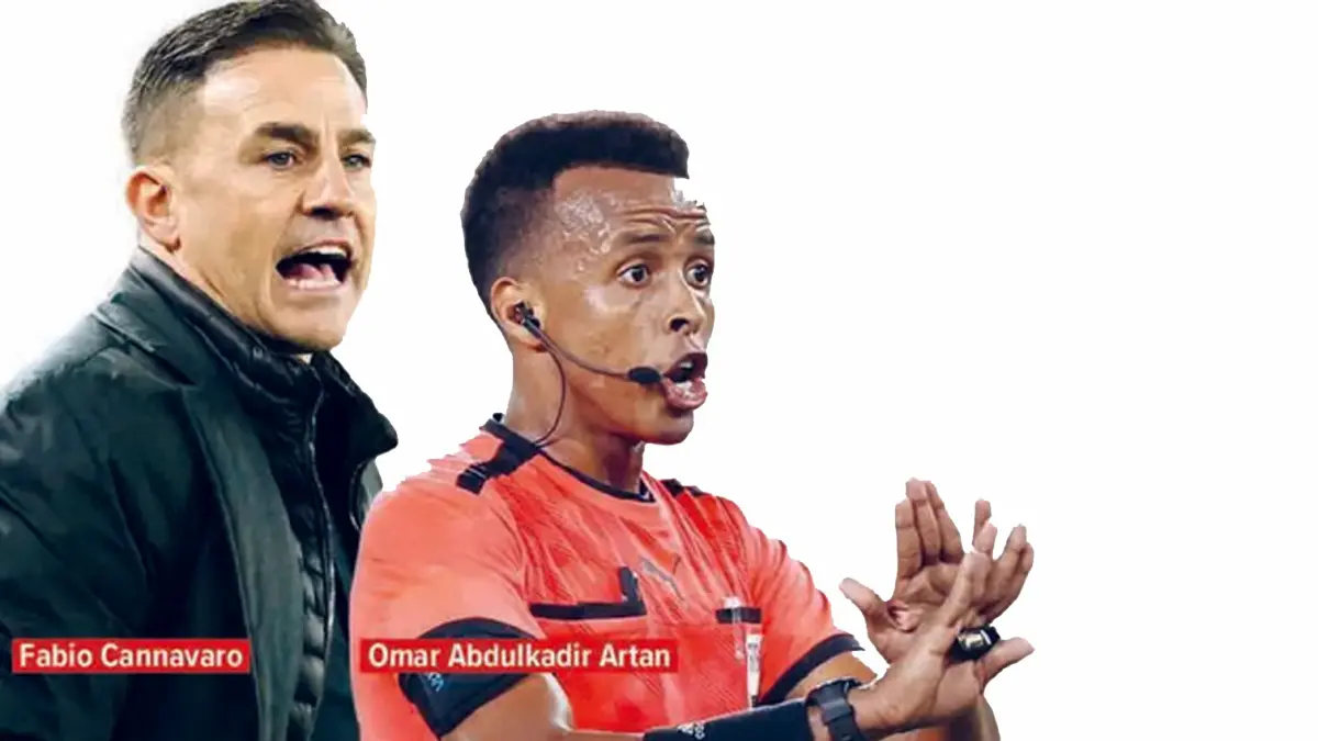 Kiri: Fabio Cannavaro, Kanan: Omar Abdulkadir Artan (Foto: Koran Jawa Pos)