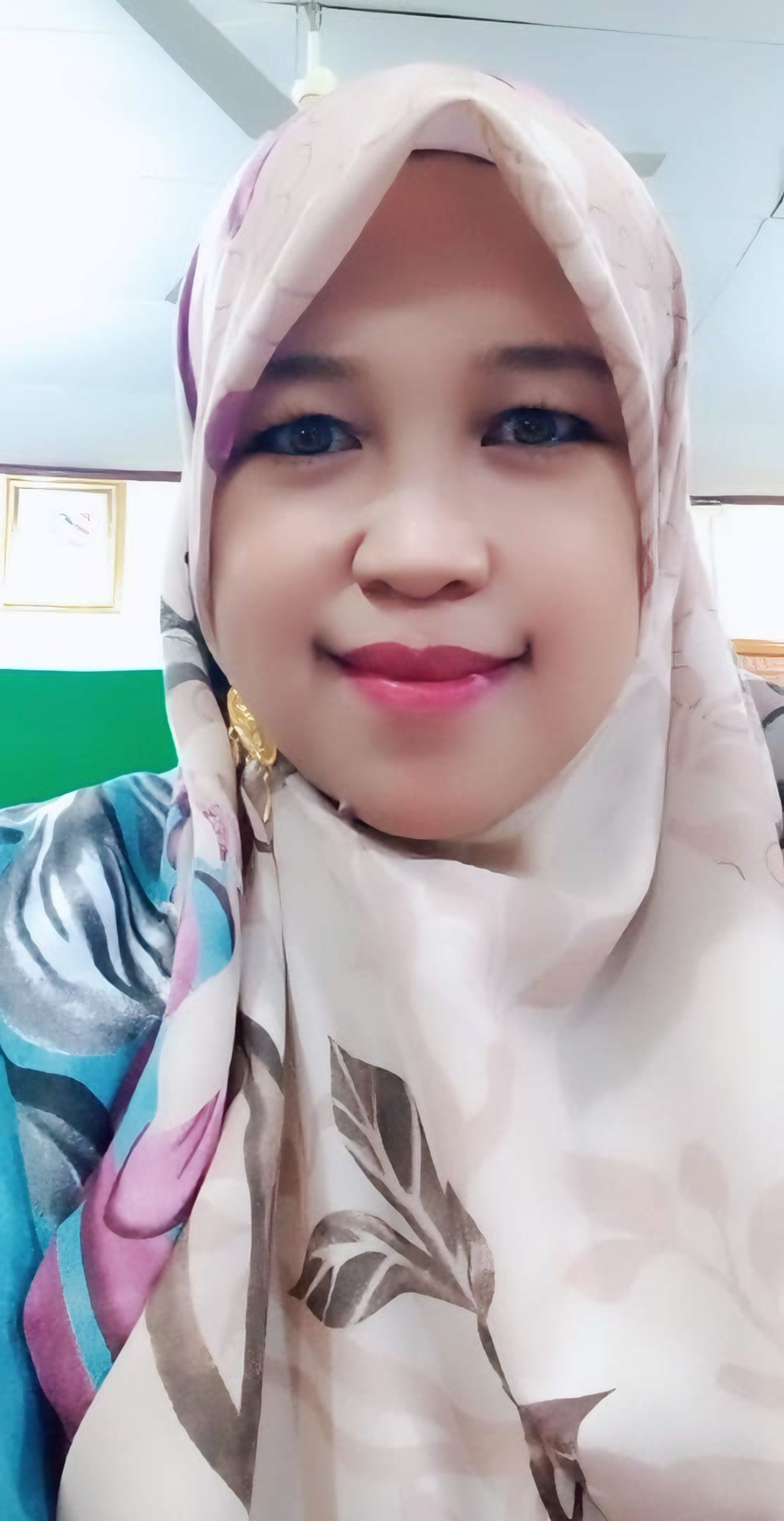 Dilla, S.Pd, GURU SMPN 2 BUKITTINGGI.(TIM LAMAN GURU)