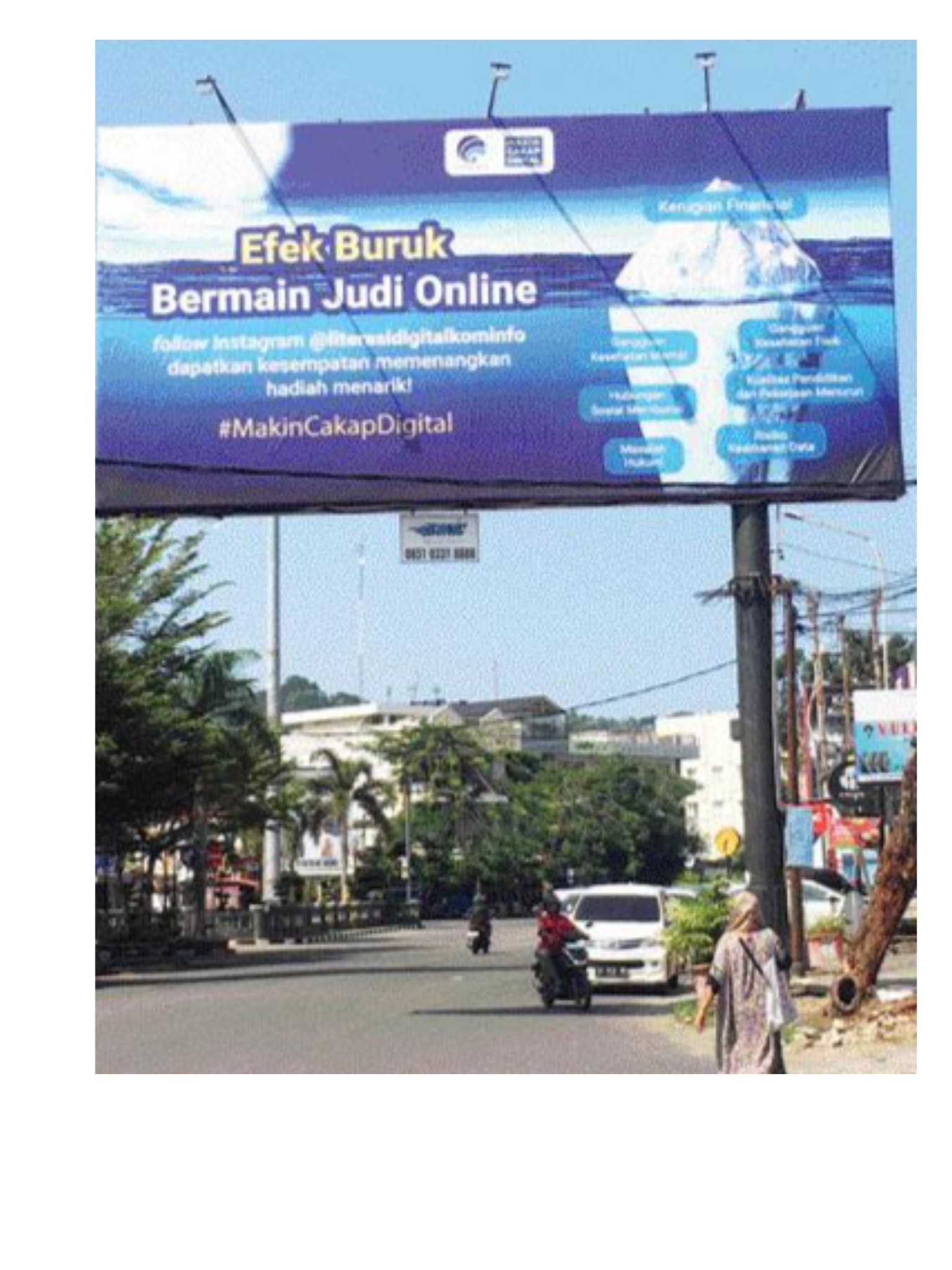 PERLU DIBERSAMAI: Salah satu upaya pemerintah untuk mengatasi persoalan judi online terpampang pada bilboard di Jalan Diponegoro, Kota Padang, kemarin (2/7). (SILVINA FADHILAH/PADEK)