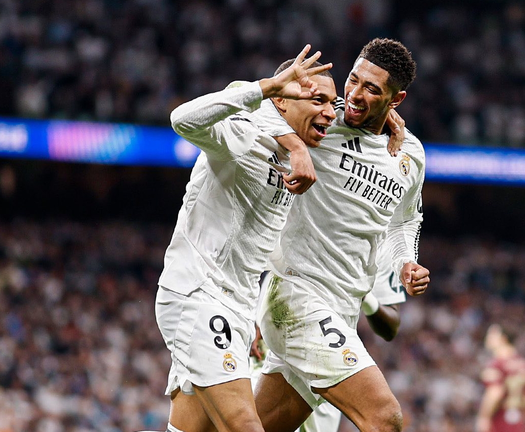 Selebrasi Kylian Mbappe bersama Jude Bellingham usai mencetak hattrick melawan Manchester City di Liga Champions. (Foto: Instagram @k.mbappe)