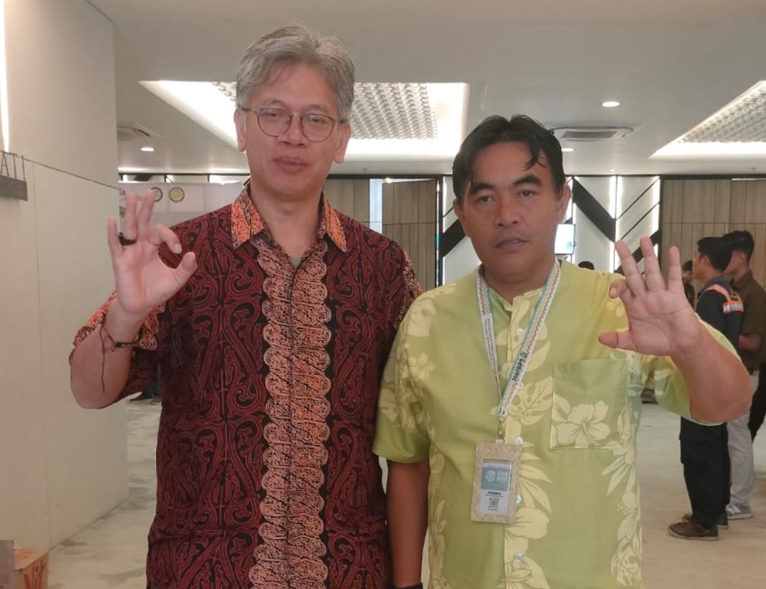 GM Geopark Sianok Maninjau Zuhrizul (kanan) bersama Direktur Sumber Daya Energi, Mineral, dan Pertambangan Bappenas, Togu Pardede.(*)